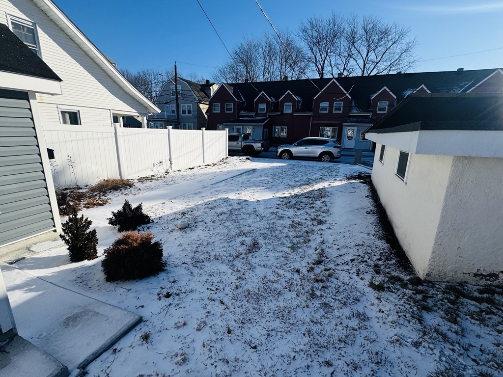 73 Victoria Street Revere, MA 02151 - Photo 24 of 24 a view of a back yard of the house