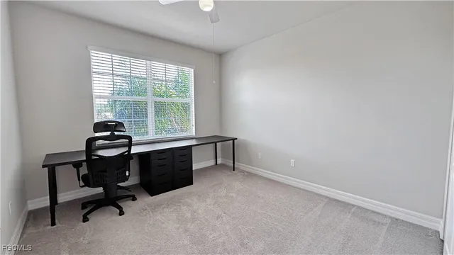 a room with furniture and a window