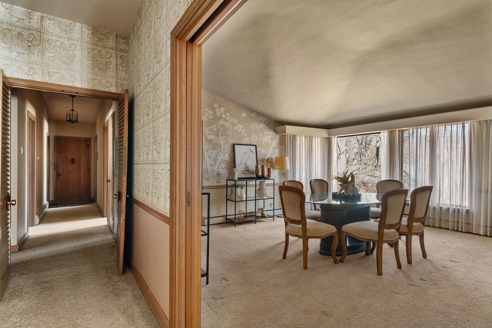 3108 26th Street Moline, IL 61265 - Photo 14 of 62 a view of a dining room with furniture and a window