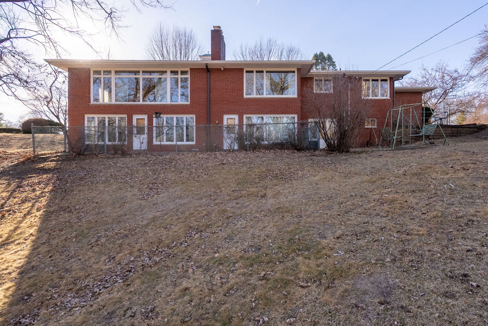3108 26th Street Moline, IL 61265 - Photo 47 of 62 a front view of a house with a yard