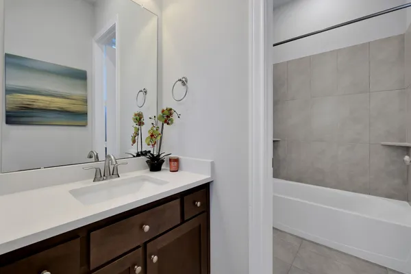 a bathroom with a bathtub and toilet