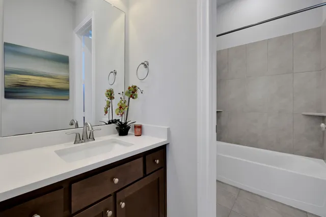 a bathroom with a bathtub and toilet