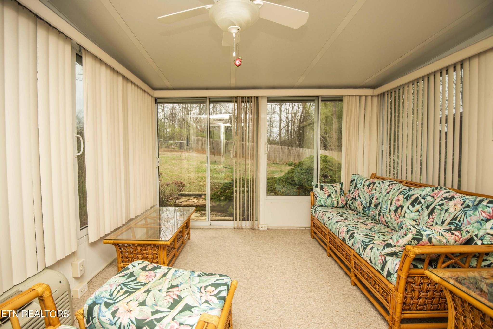 1280 Laurel Road Clinton, TN 37716 - Photo 15 of 36 a living room with furniture and a rug