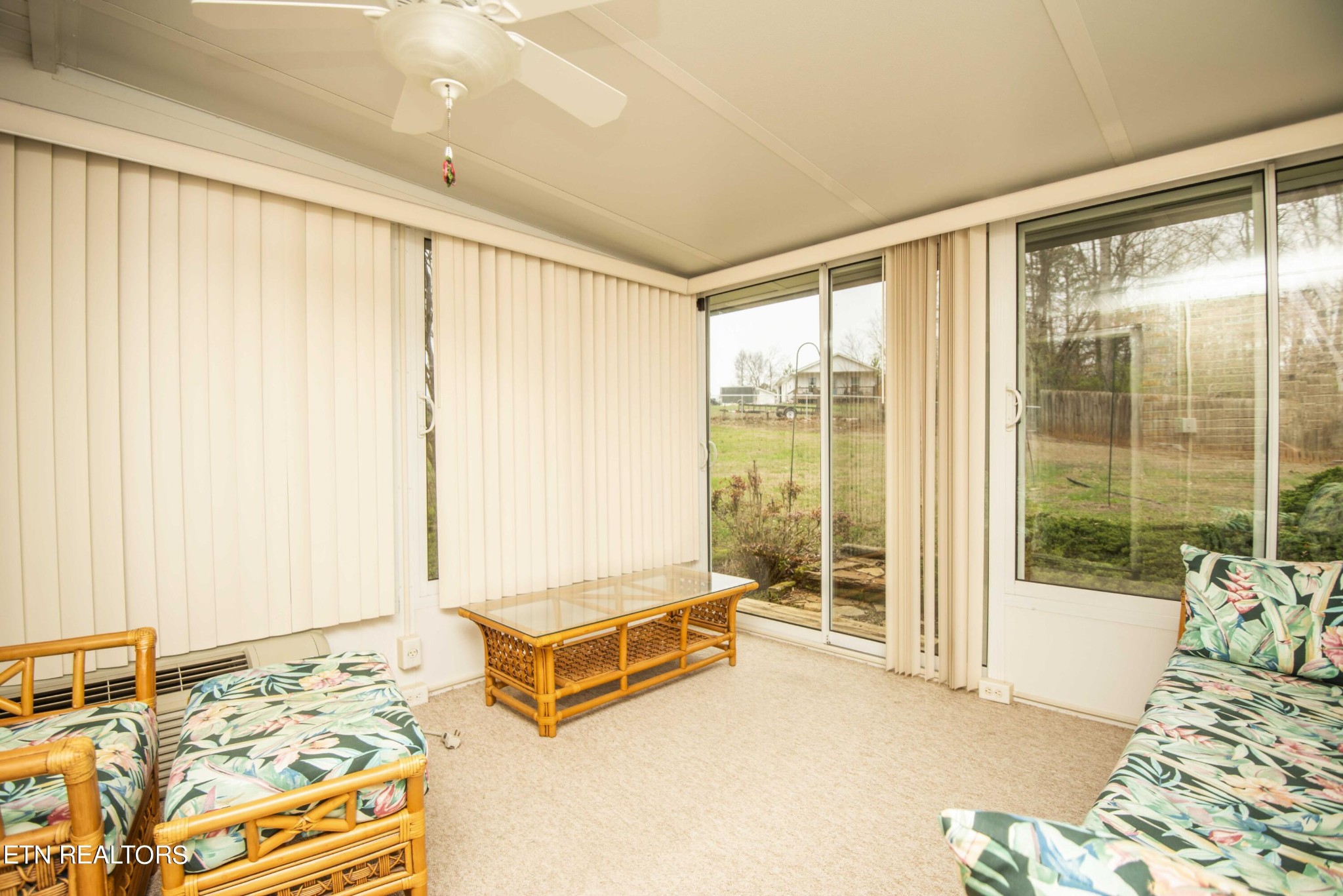 1280 Laurel Road Clinton, TN 37716 - Photo 16 of 36 a living room with a bed and next to a window