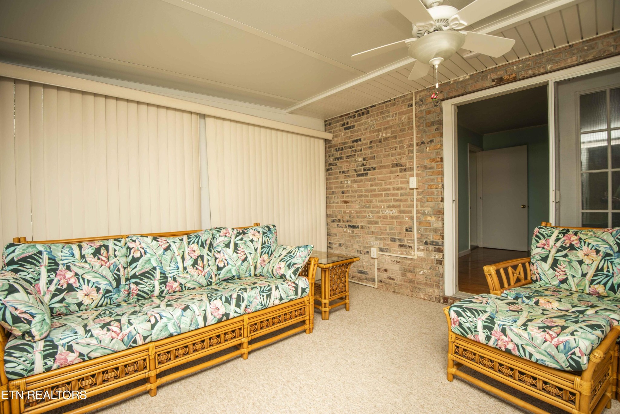 1280 Laurel Road Clinton, TN 37716 - Photo 17 of 36 a bed sitting in a bedroom next to a window and a chandelier