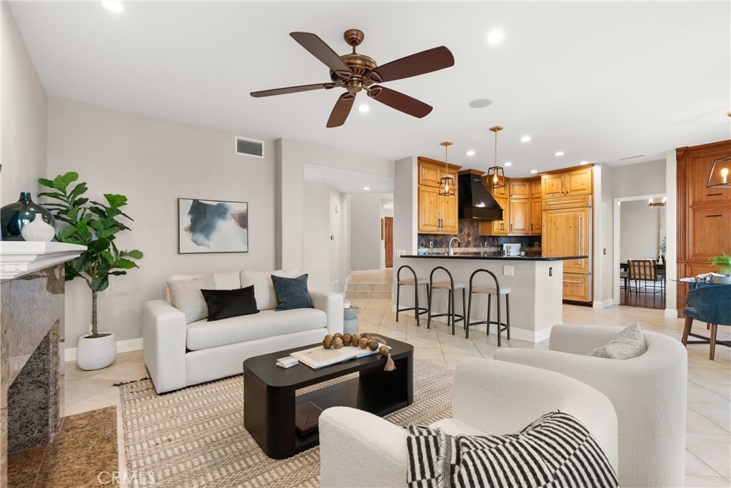 8 Rimani Drive Mission Viejo, CA 92692 - Photo 17 of 56 a living room with furniture kitchen view and a chandelier