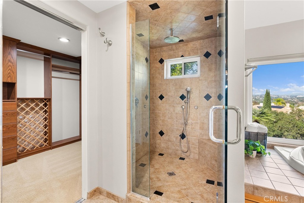 8 Rimani Drive Mission Viejo, CA 92692 - Photo 28 of 56 a bathroom with a shower