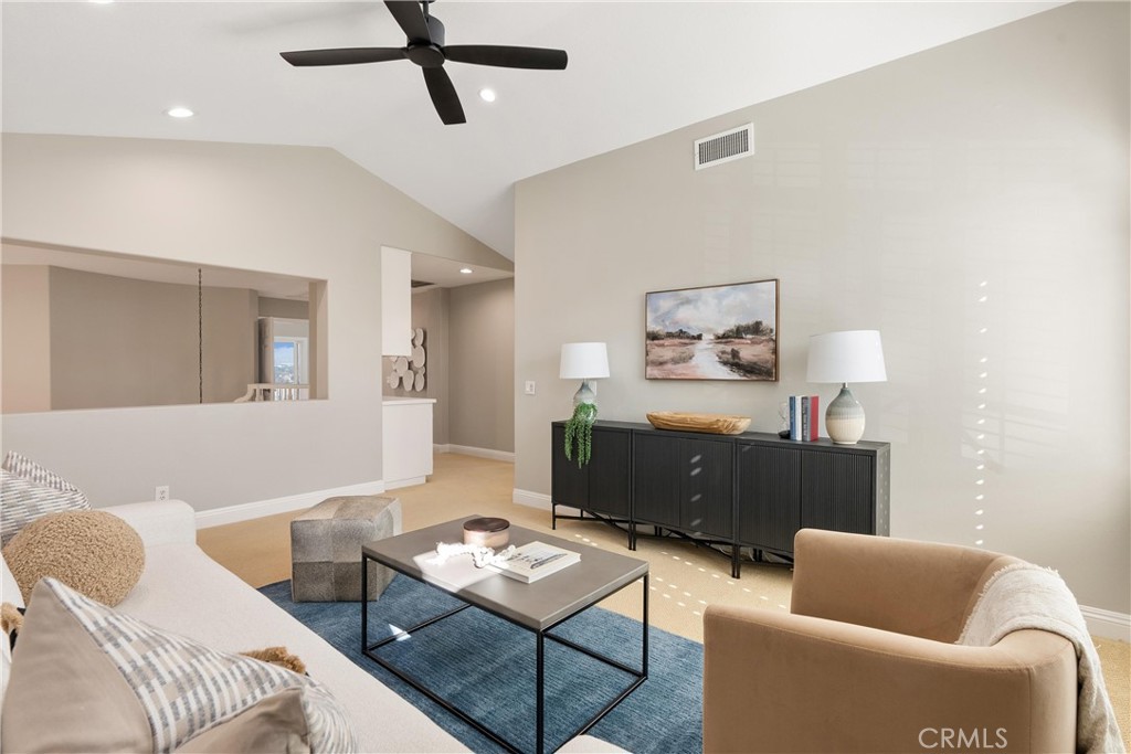 8 Rimani Drive Mission Viejo, CA 92692 - Photo 32 of 56 a living room with furniture and a couch