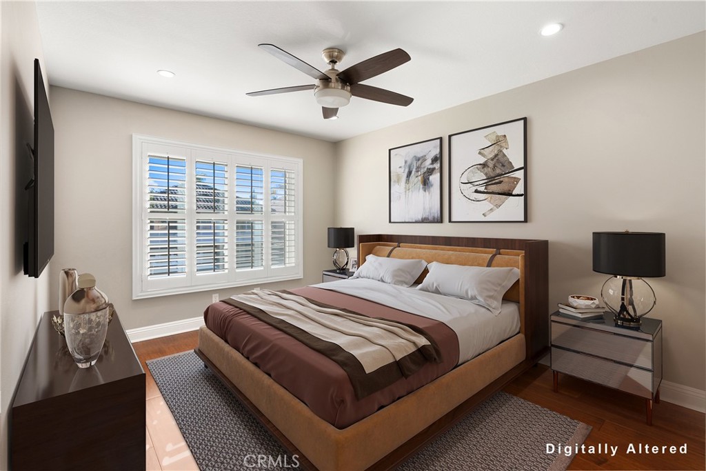 8 Rimani Drive Mission Viejo, CA 92692 - Photo 33 of 56 a spacious bedroom with a bed and a large window