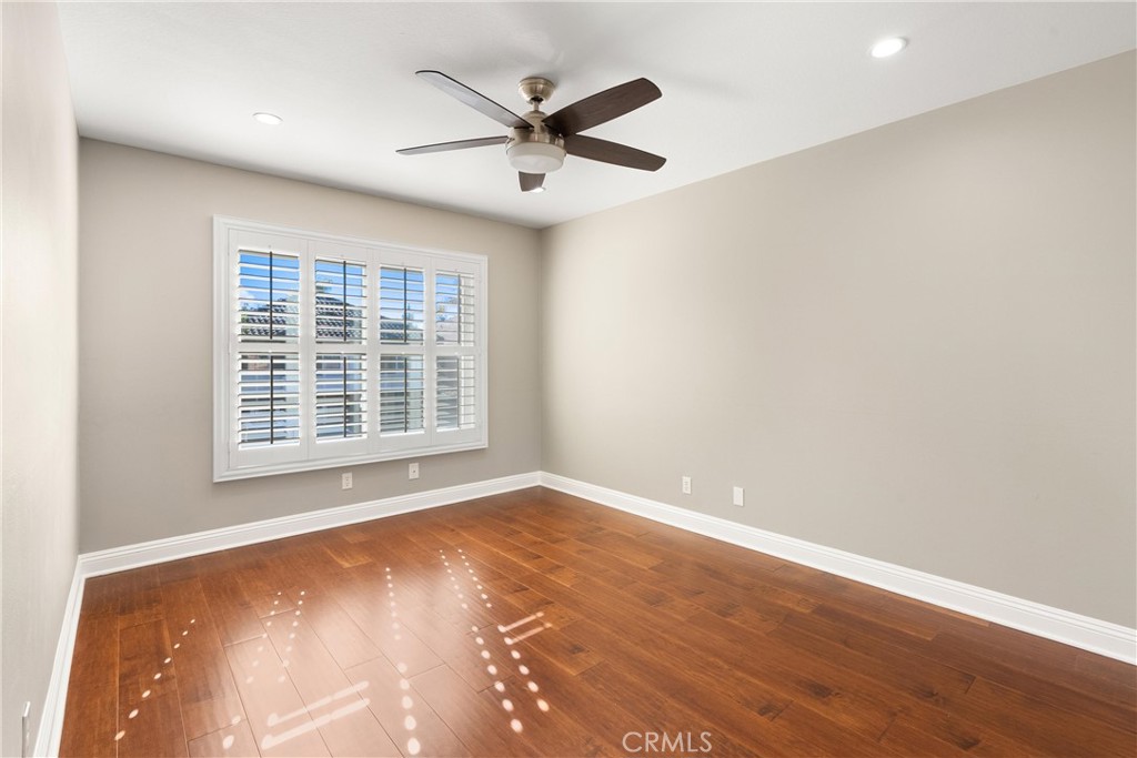 8 Rimani Drive Mission Viejo, CA 92692 - Photo 34 of 56 an empty room with wooden floor and windows