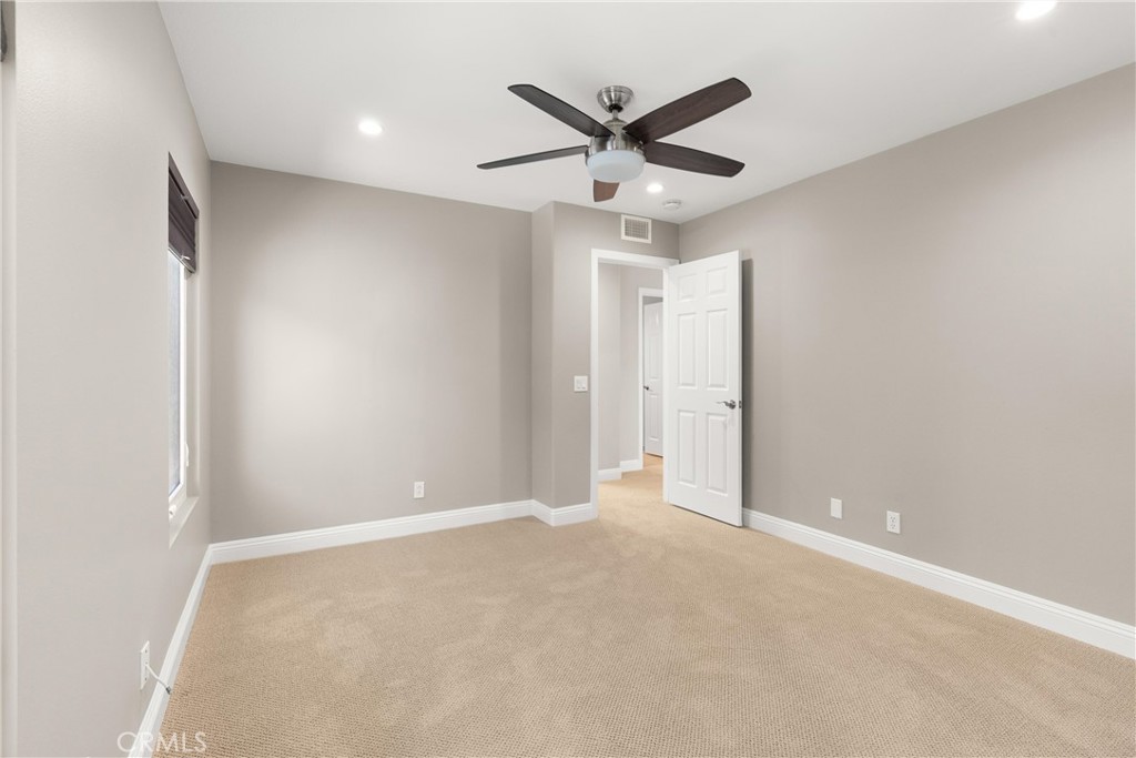 8 Rimani Drive Mission Viejo, CA 92692 - Photo 36 of 56 an empty room with closet and view of a ceiling fan