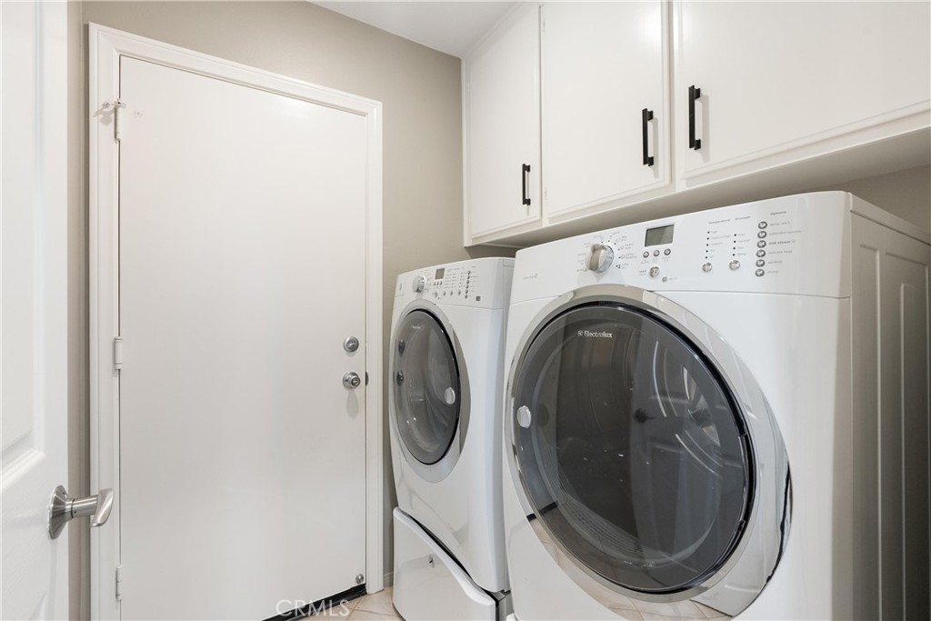 8 Rimani Drive Mission Viejo, CA 92692 - Photo 40 of 56 a utility room with dryer and washer
