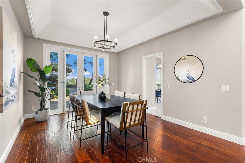 8 Rimani Drive Mission Viejo, CA 92692 - Photo 8 of 56 a view of a dining room with furniture window and wooden floor