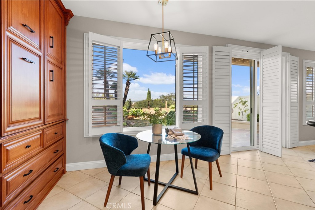 8 Rimani Drive Mission Viejo, CA 92692 - Photo 9 of 56 a dining room with furniture and window