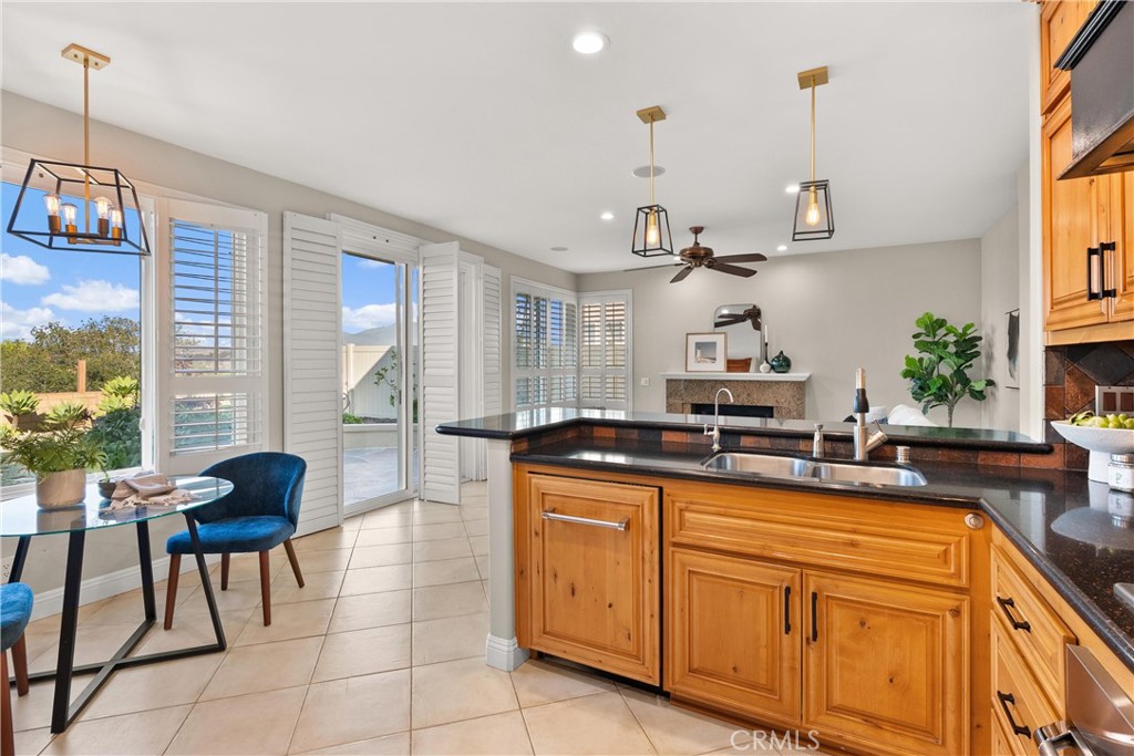 8 Rimani Drive Mission Viejo, CA 92692 - Photo 10 of 56 a kitchen with stainless steel appliances granite countertop a sink and cabinets