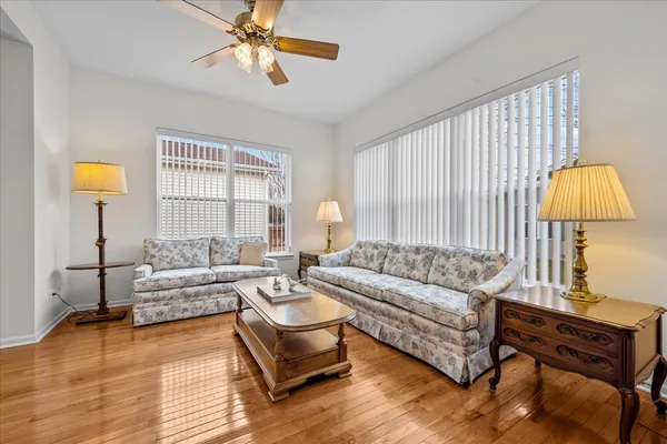 a living room with furniture and a window