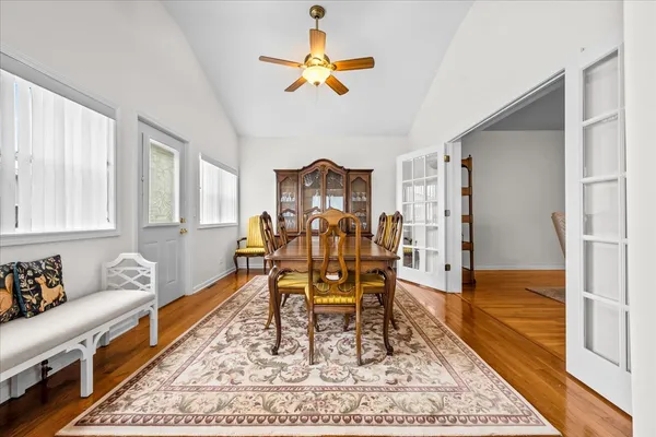 a living room with furniture and a rug