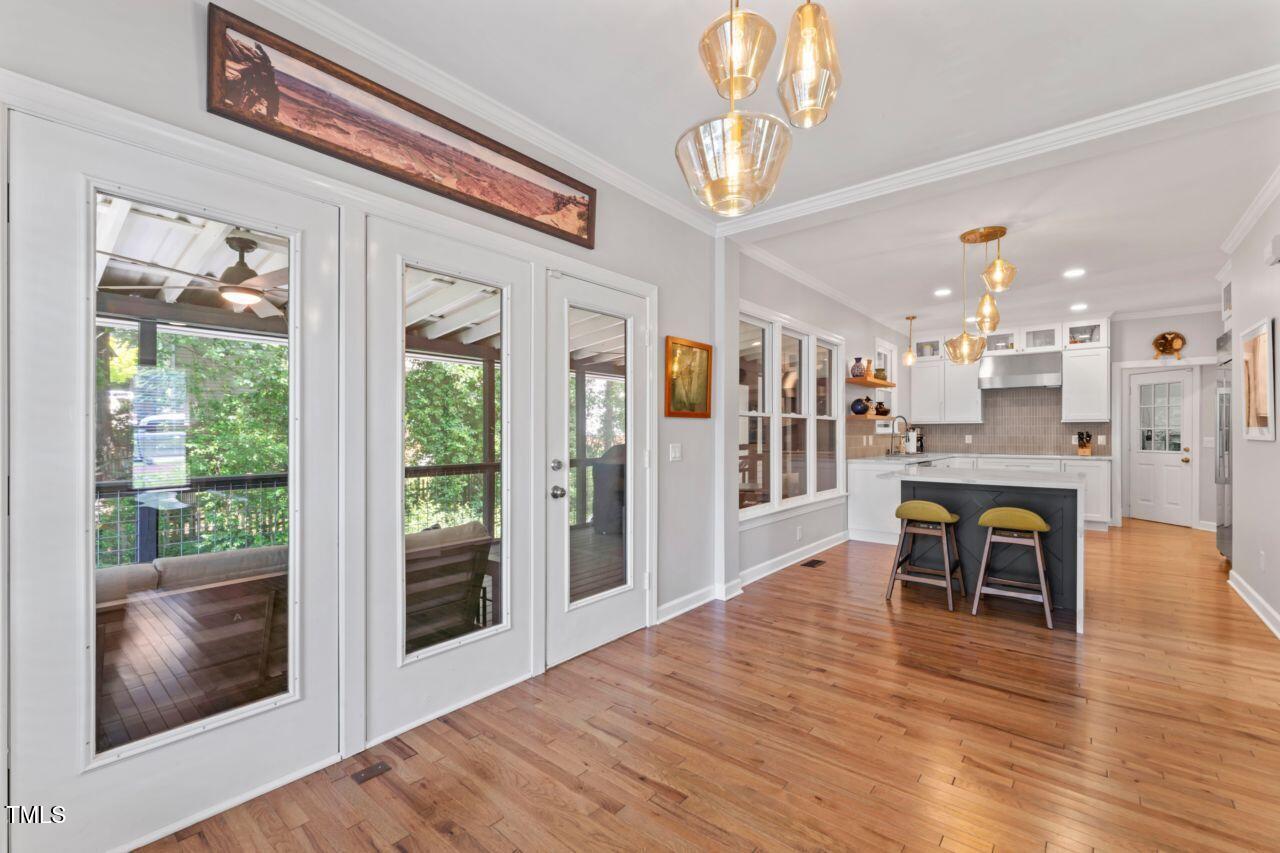 4408 Queenstown Court Raleigh, NC 27612 - Photo 14 of 49 a view of a kitchen and dining room