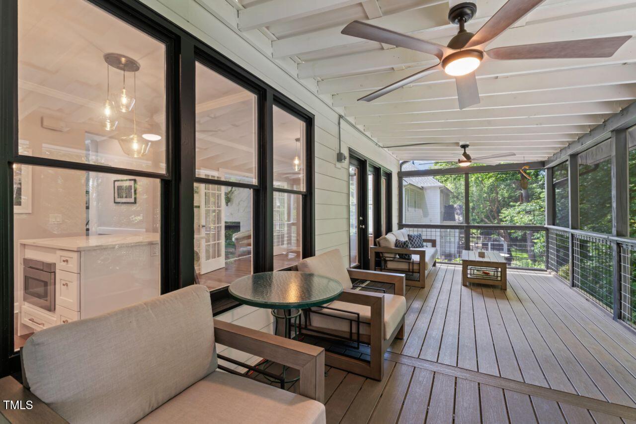 4408 Queenstown Court Raleigh, NC 27612 - Photo 20 of 49 a living room with furniture and a large window