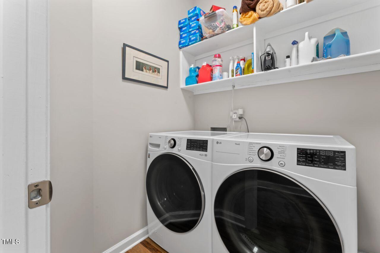 4408 Queenstown Court Raleigh, NC 27612 - Photo 27 of 49 a utility room with dryer and washer