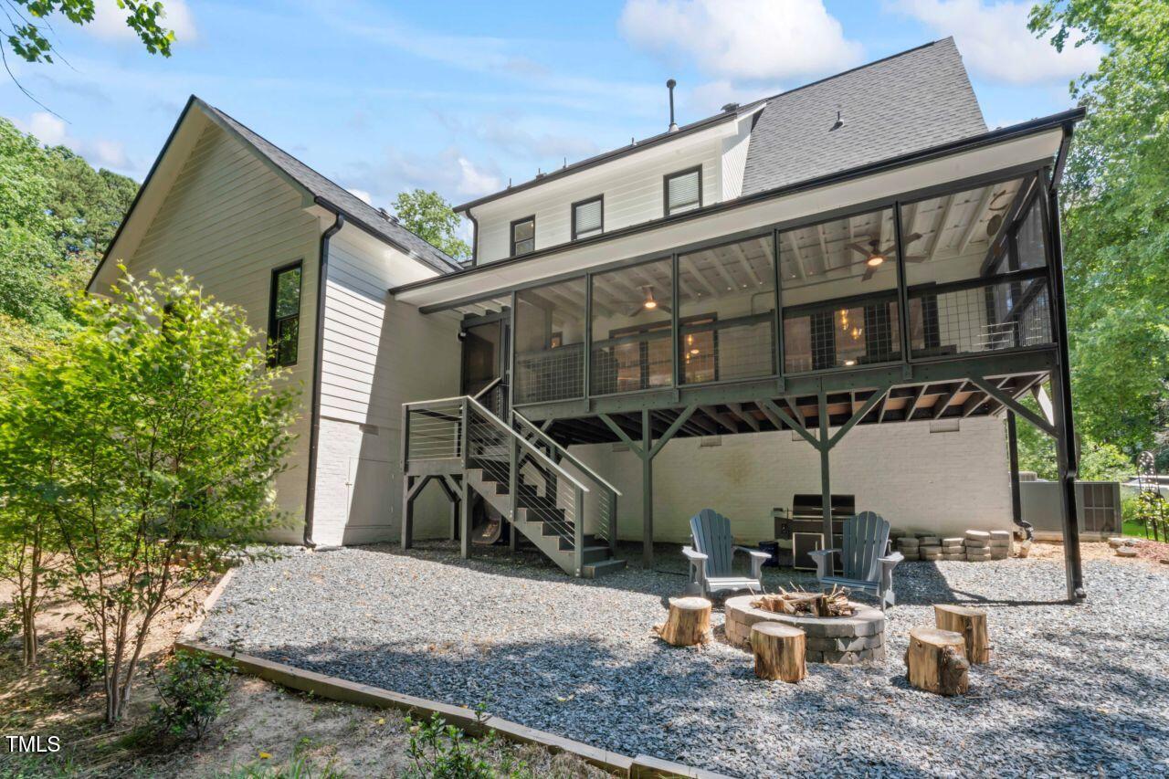 4408 Queenstown Court Raleigh, NC 27612 - Photo 44 of 49 a view of house with a outdoor space