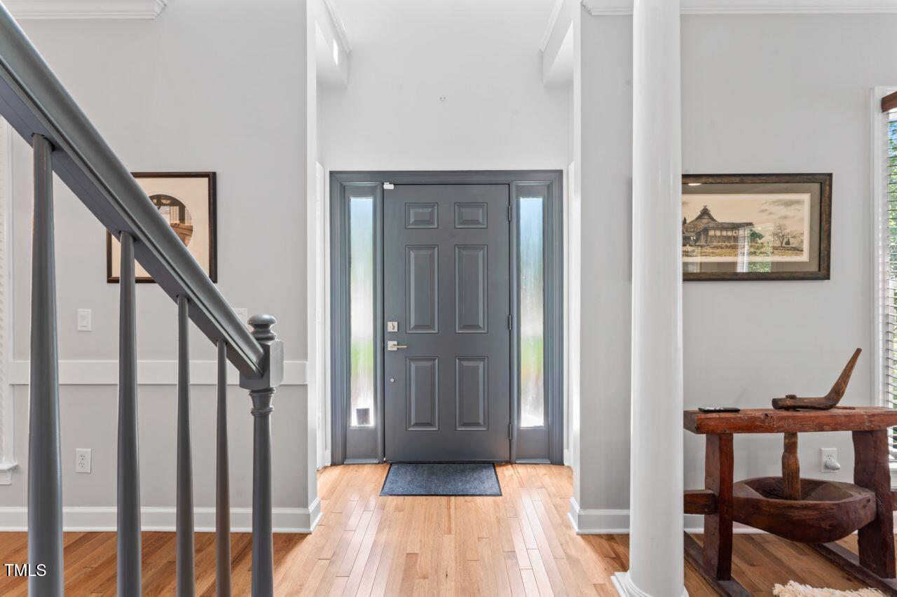 4408 Queenstown Court Raleigh, NC 27612 - Photo 7 of 49 a view of a hallway with seating area