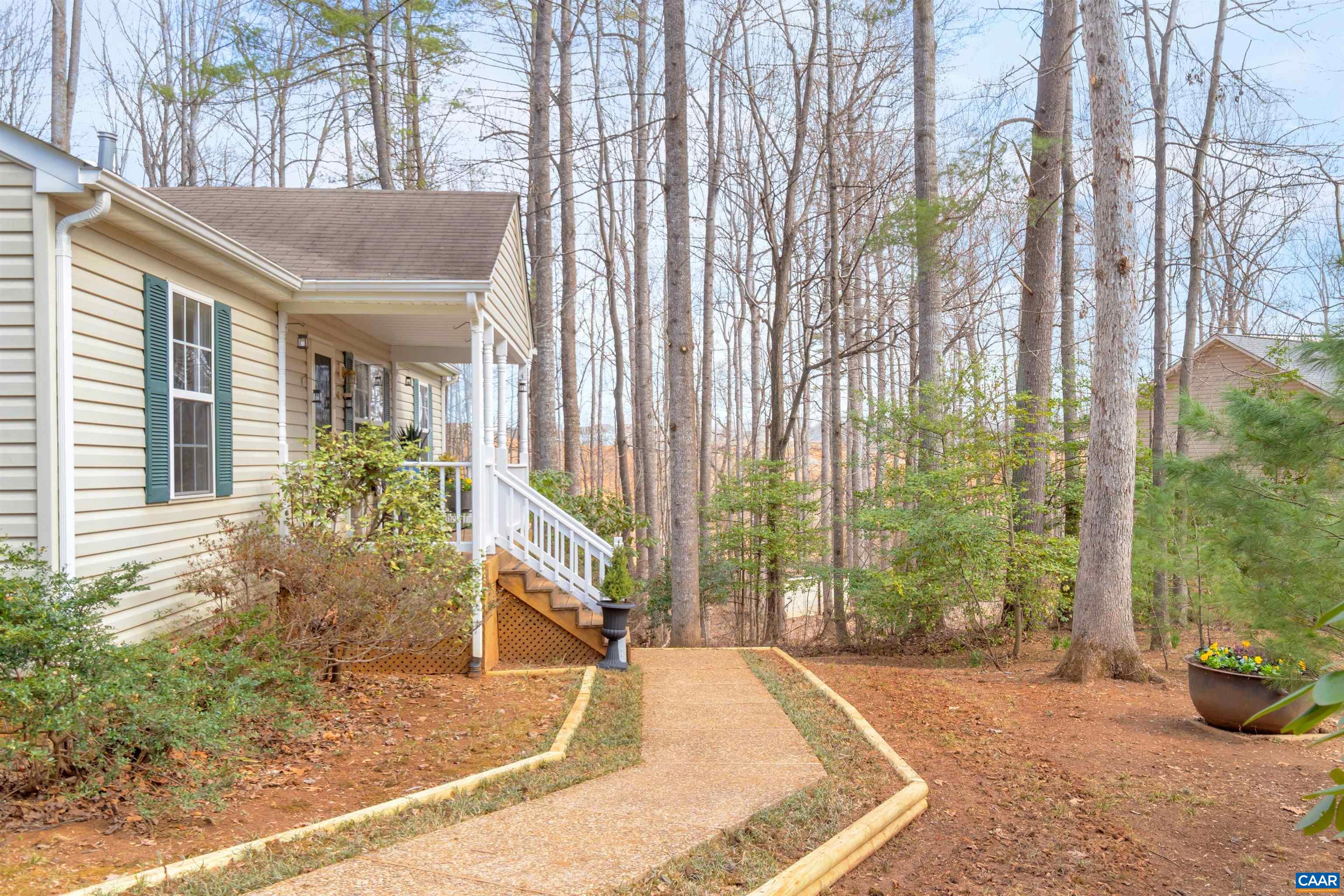 415 Rudolph Street Ruckersville, VA 22968 - Photo 1 of 38 a view of a house with backyard and sitting area