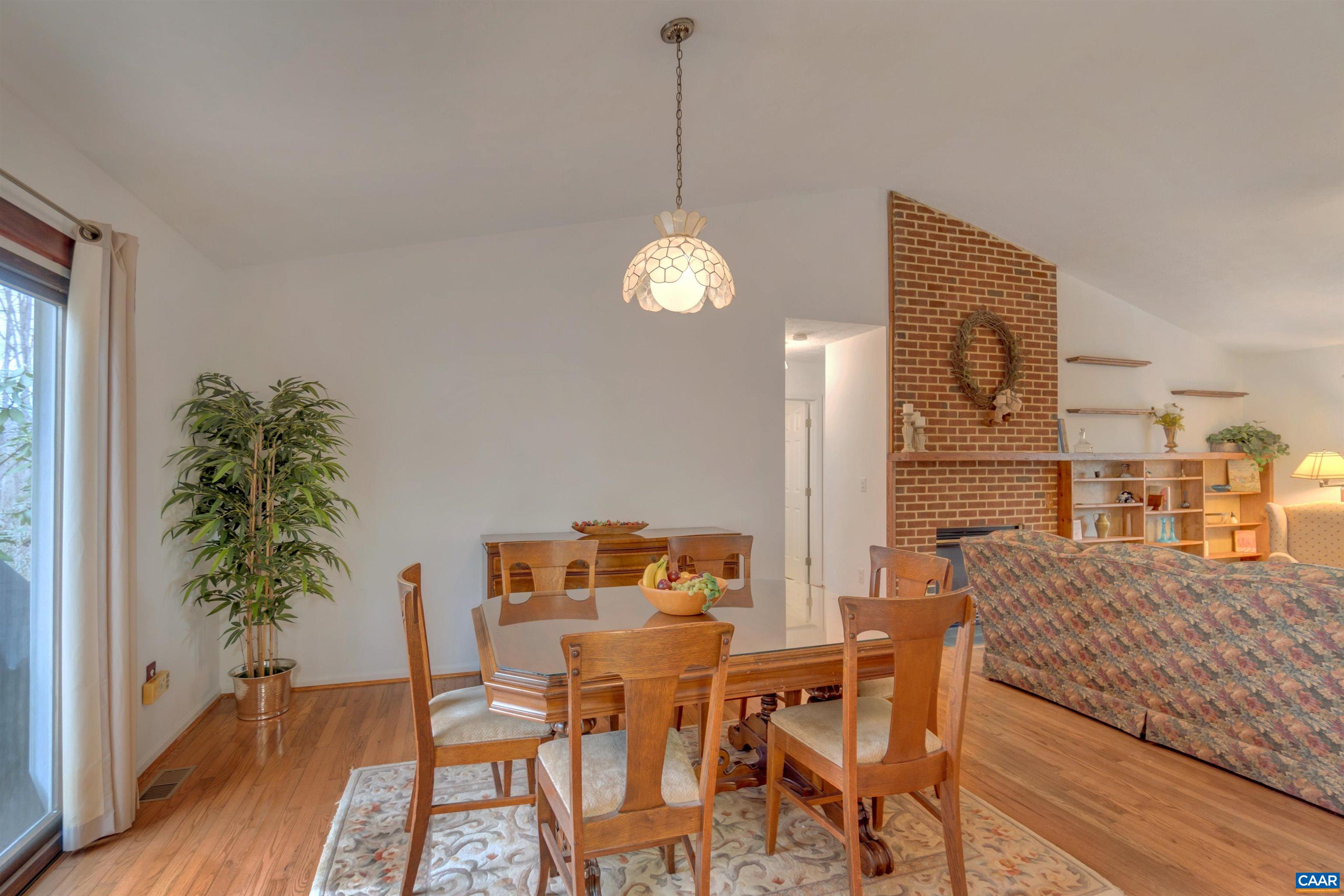 415 Rudolph Street Ruckersville, VA 22968 - Photo 12 of 38 a view of a dining room with furniture and wooden floor