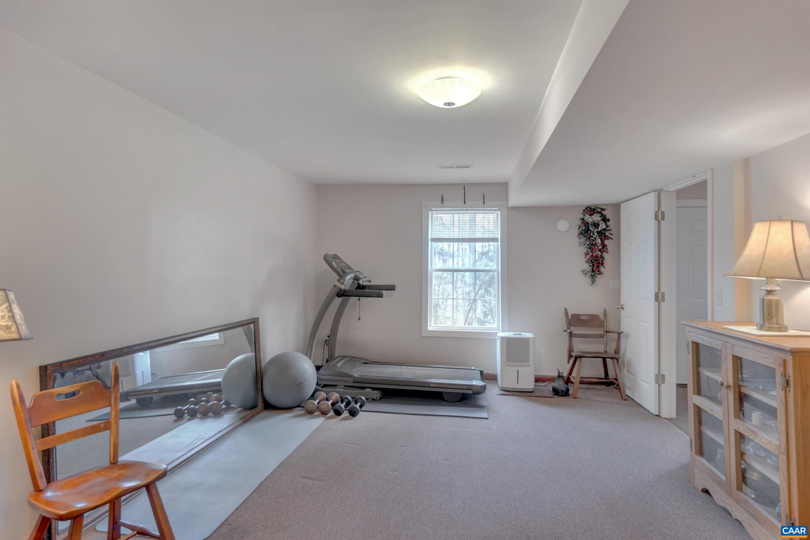 415 Rudolph Street Ruckersville, VA 22968 - Photo 27 of 38 a bedroom with furniture and a window