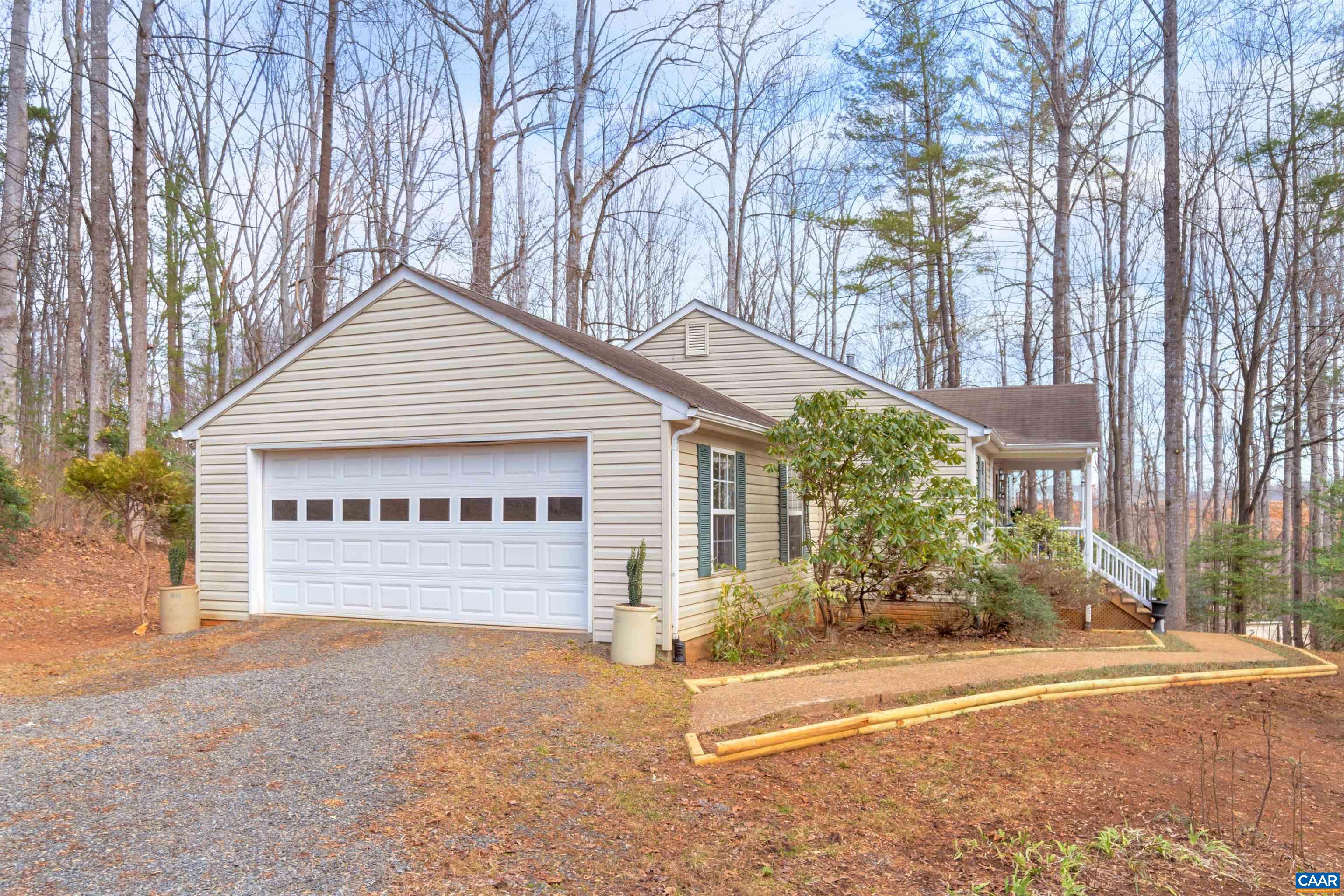 415 Rudolph Street Ruckersville, VA 22968 - Photo 4 of 38 a view of a house with a yard and garage