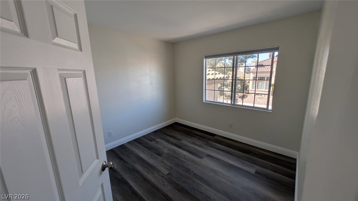 2670 Ridgewater Circle Henderson, NV 89074 - Photo 15 of 22 This bright room features durable flooring, offering a versatile space for any need.