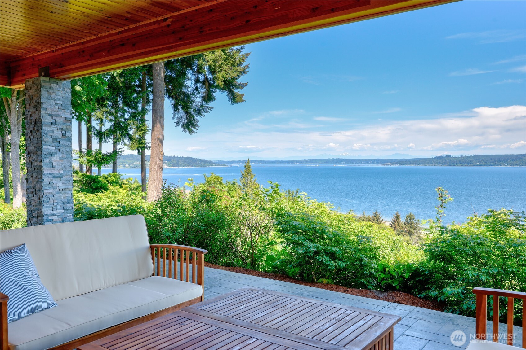 1411 Thorndyke Road Port Ludlow, WA 98365 - Photo 23 of 40 a view of a backyard with sitting area