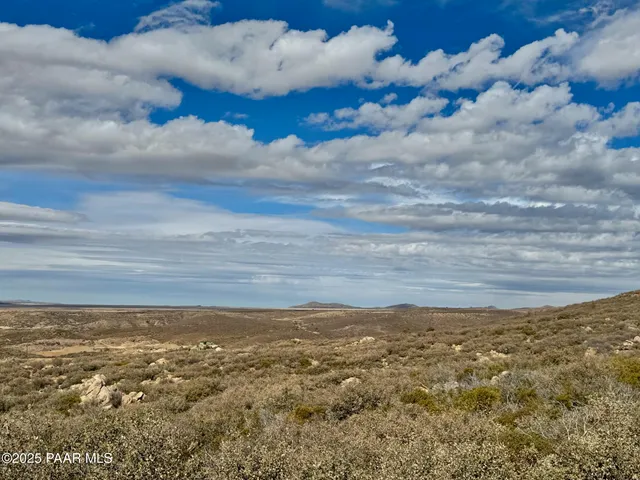 a view of ocean and mountain