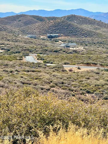 a view of lake and mountain