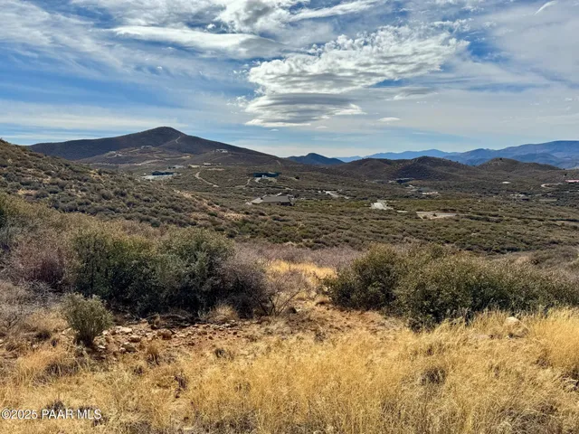 a view of ocean and mountain