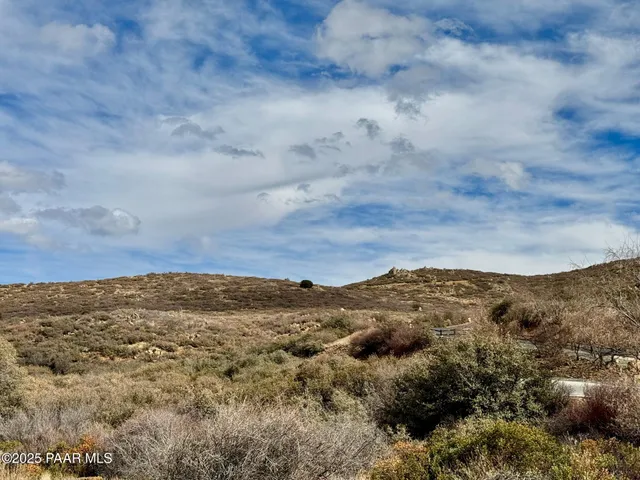 a view of mountains and valleys