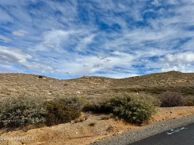 a view of ocean and mountain