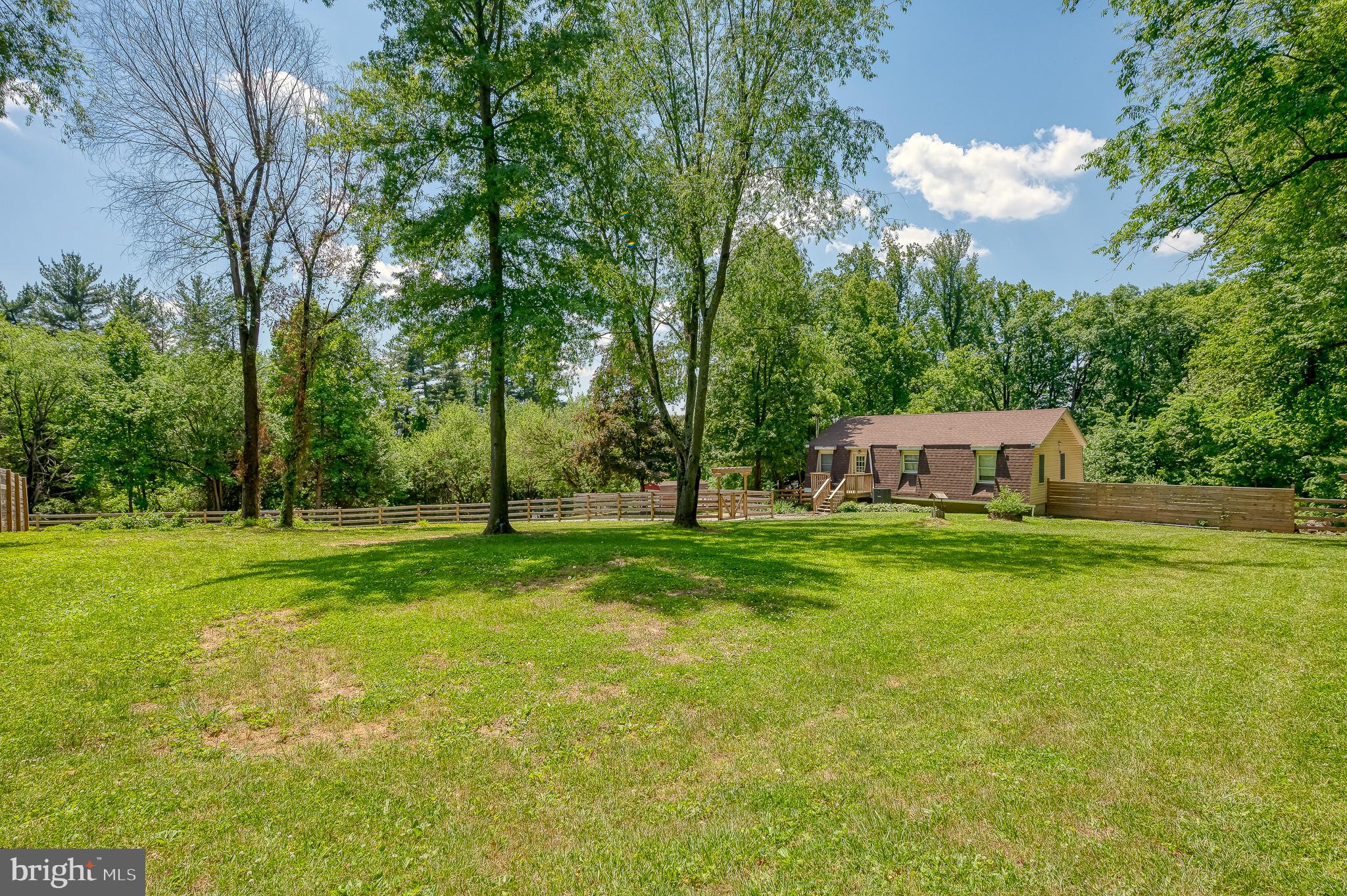305 Crowl Road Westminster, MD 21158 - Photo 3 of 55 a backyard of a house with lots of green space