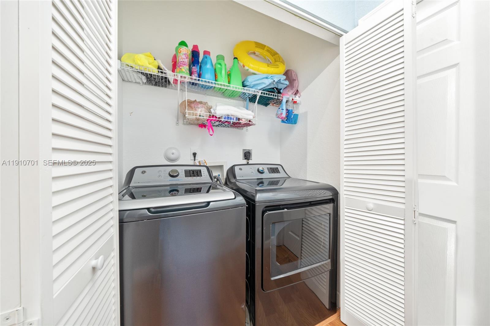 23713 Southwest 115th Avenue Homestead, FL 33032 - Photo 21 of 26 a utility room with dryer and washer