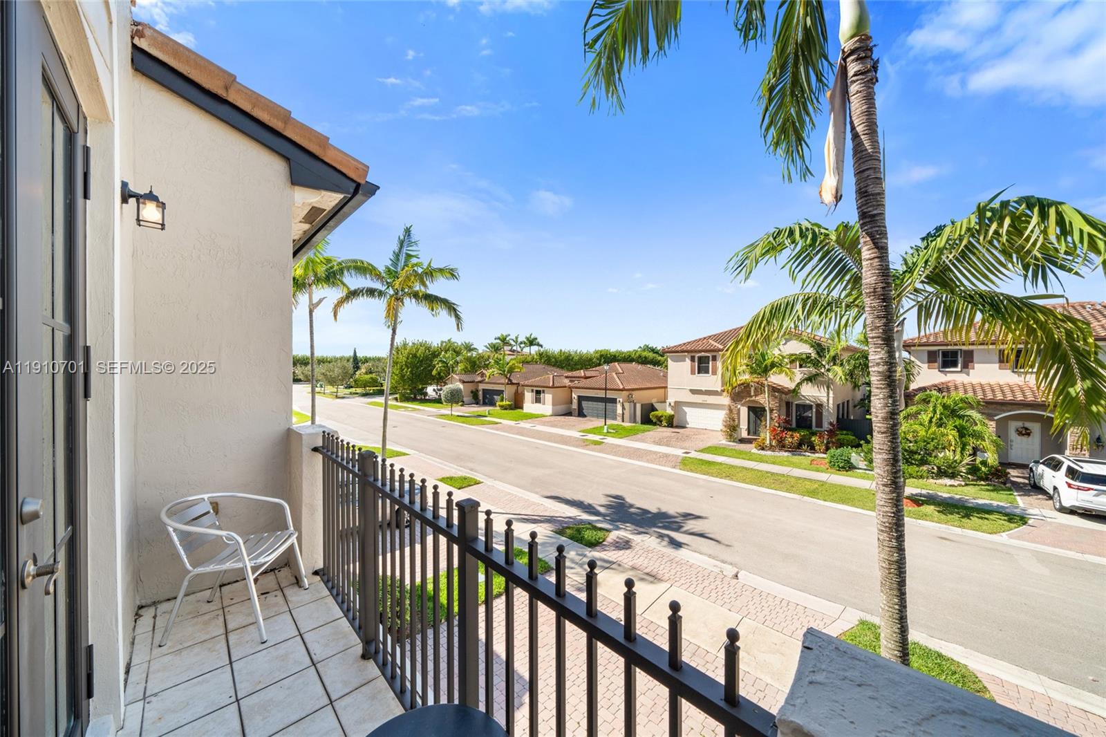 23713 Southwest 115th Avenue Homestead, FL 33032 - Photo 22 of 26 a view of a porch and garden