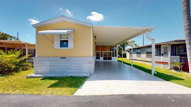 a front view of a house with swimming pool