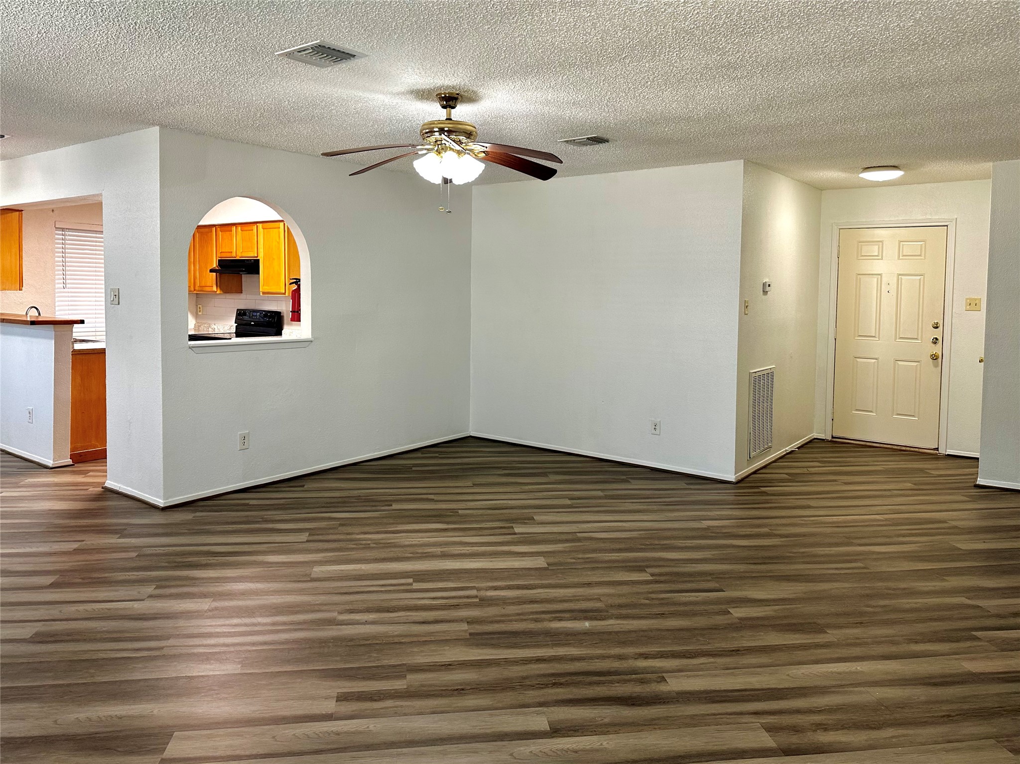 4927 Adonis Drive Spring, TX 77373 - Photo 3 of 11 a view of a room with wooden floor and window