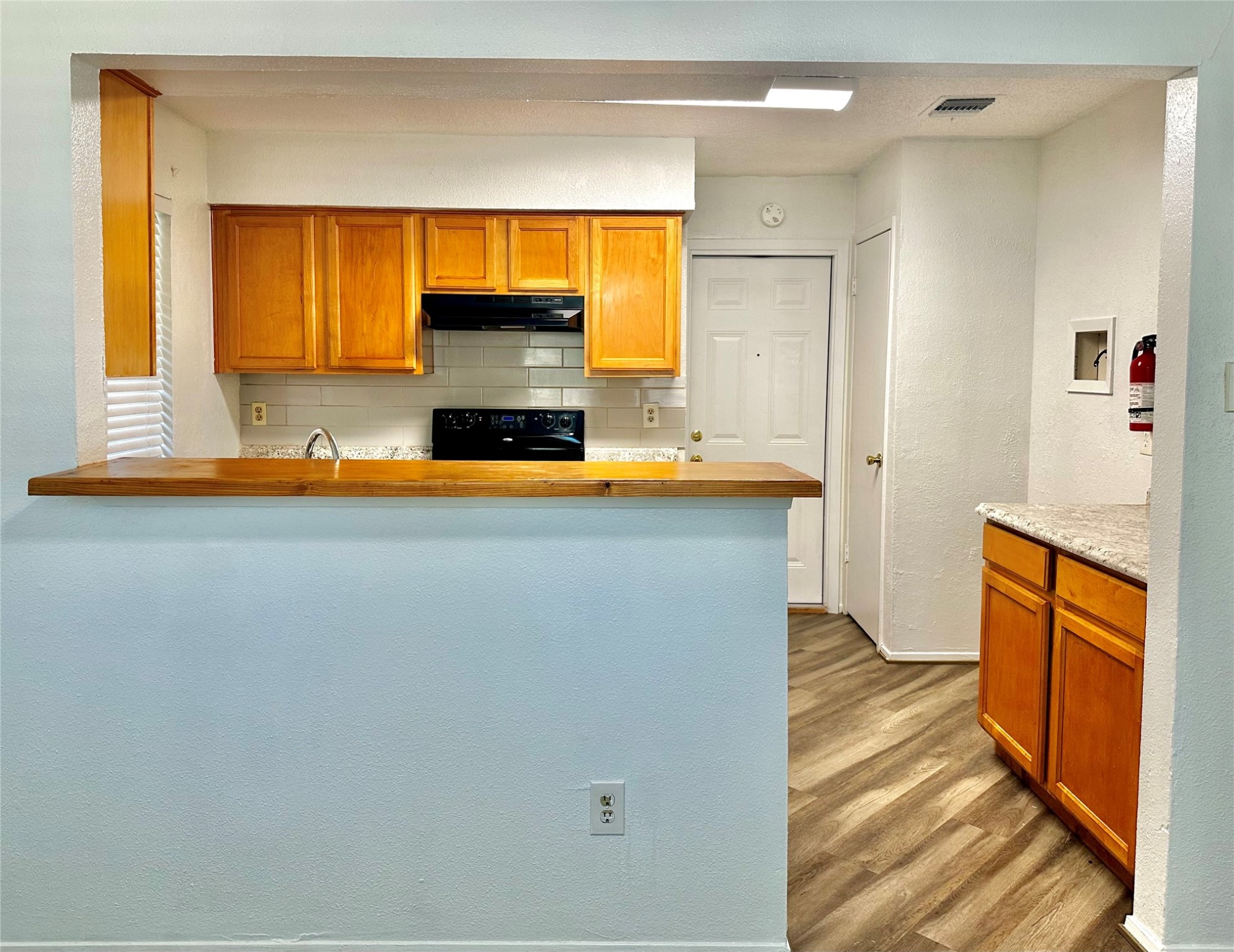 4927 Adonis Drive Spring, TX 77373 - Photo 6 of 11 a view of a kitchen with a sink and a window