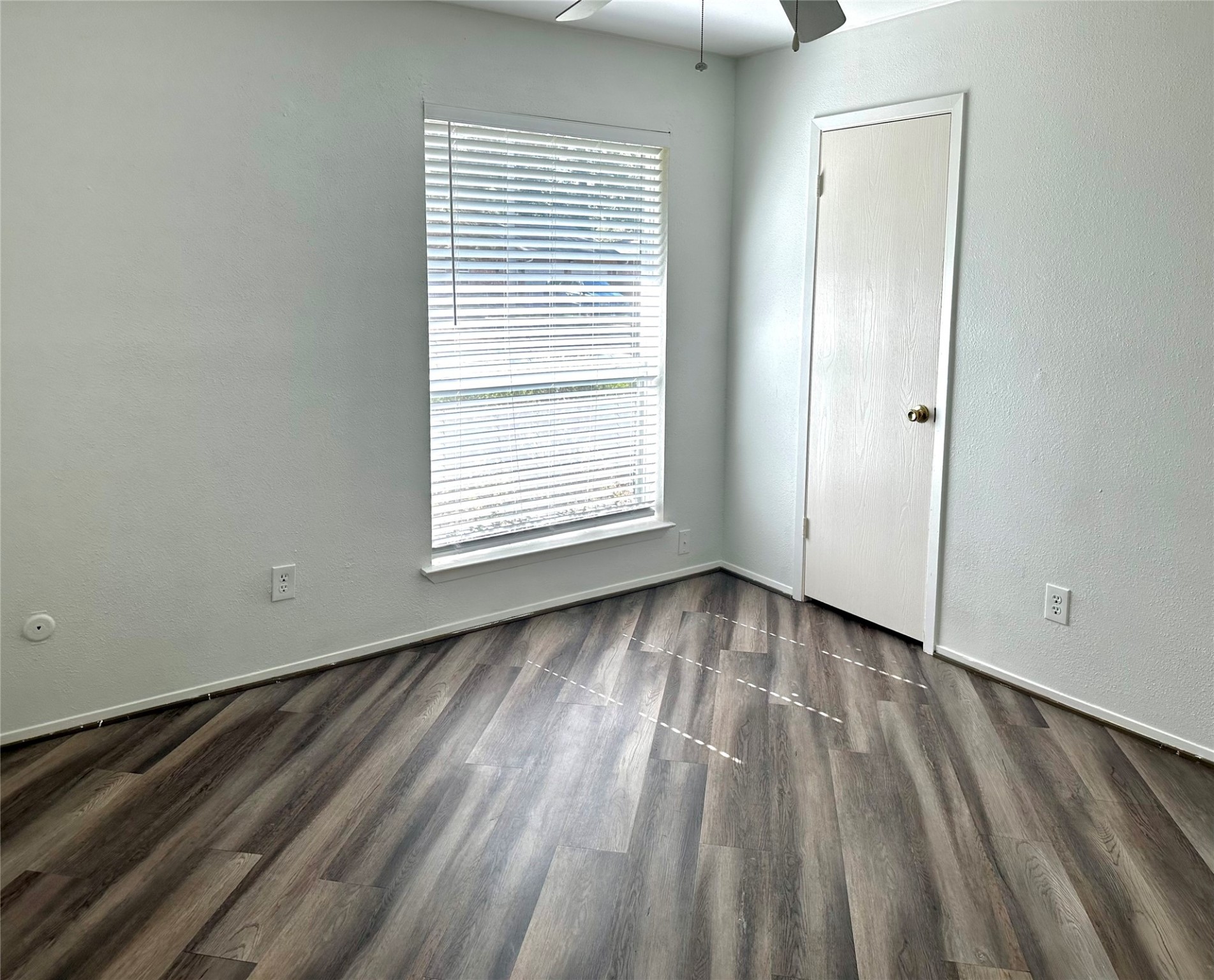 4927 Adonis Drive Spring, TX 77373 - Photo 9 of 11 wooden floor in an empty room with a window