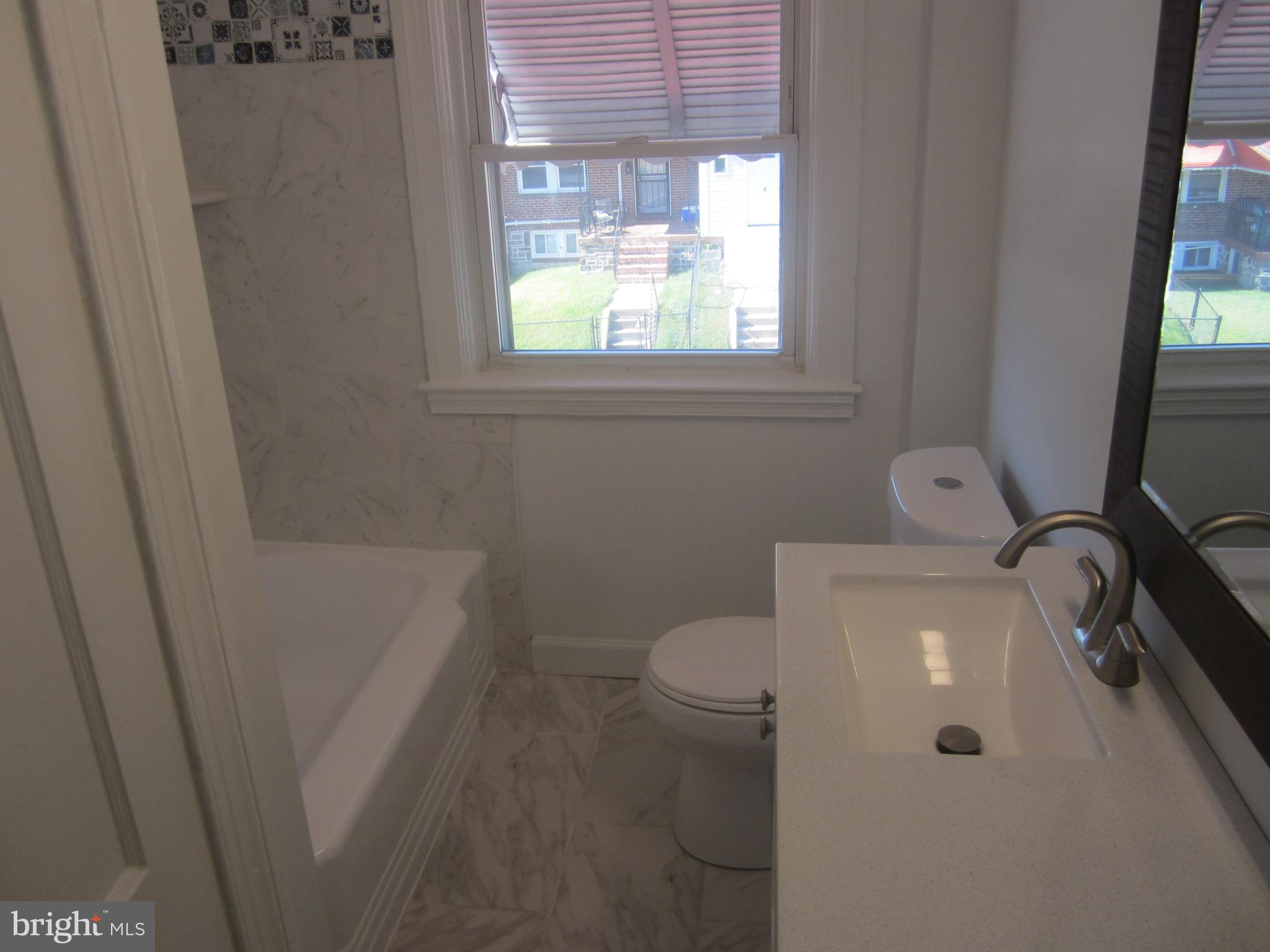 3 South Rosedale Street Baltimore, MD 21229 - Photo 18 of 29 Bathroom 1 Tub and sink
