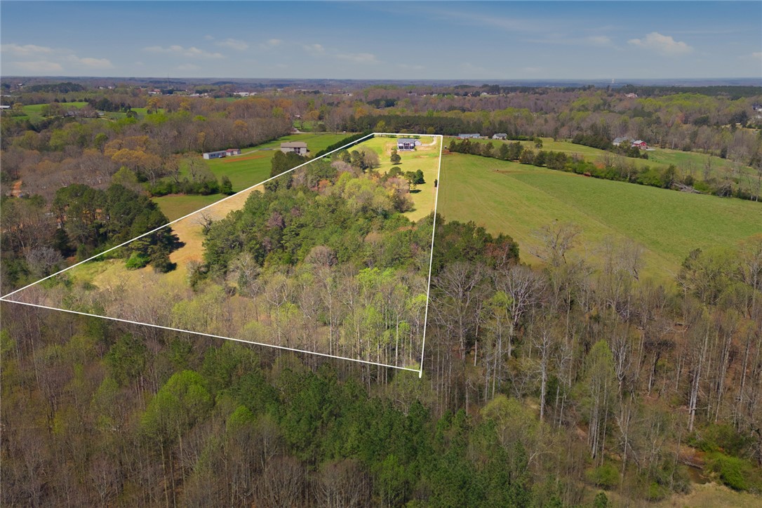 426 Oak Creek Road Seneca, SC 29678 - Photo 44 of 50 Expansive acreage provides ample space for custom building, offering serene rural views and endless possibilities.