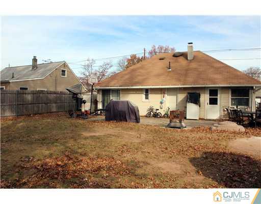 21 Brookville Road Edison, NJ 08817 - Photo 23 of 25 a view of a house with backyard