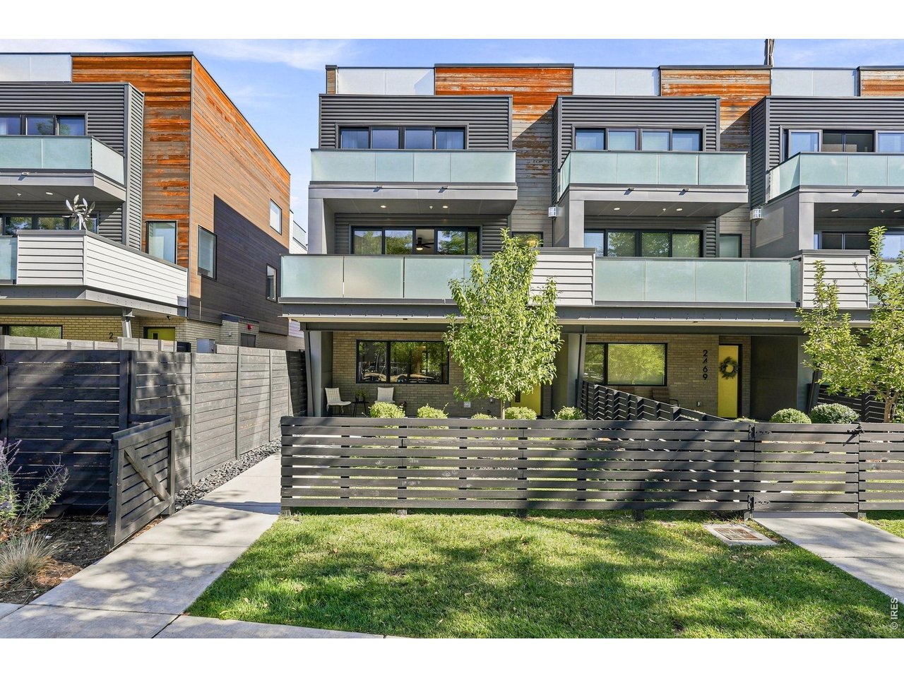 2467 Walnut Street Boulder, CO 80302 - Photo 4 of 49 Sleek from every angle this Walnut Crossing end-unit townhome makes a statement day or night.