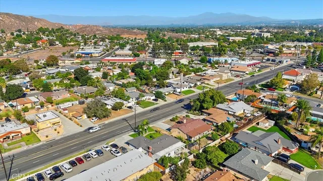 an aerial view of city and lake