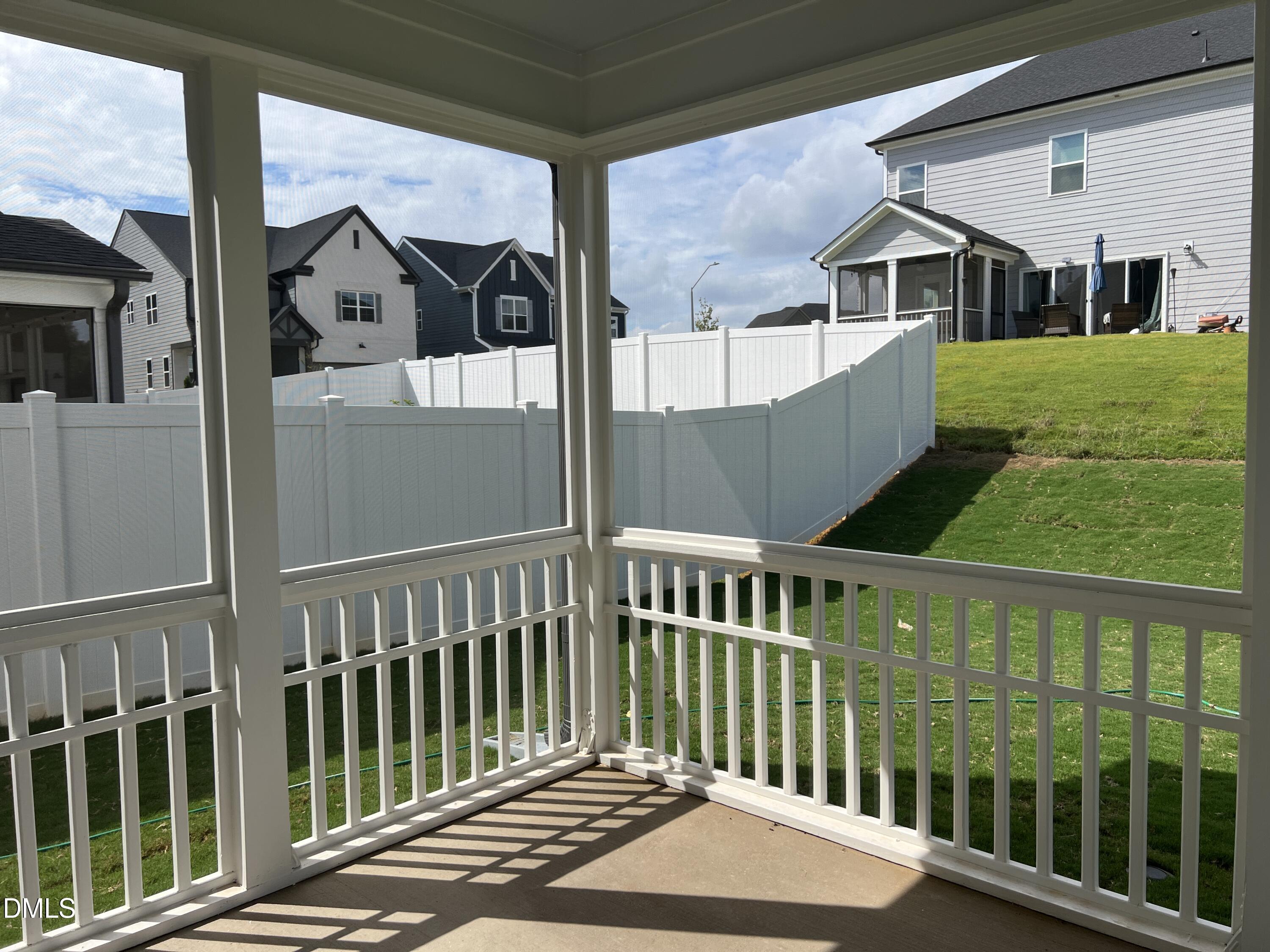 4305 Darius Lane, Unit 27 Willow Spring, NC 27592 - Photo 15 of 18 a view of a house with wooden fence